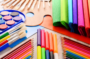 Composition with school accessories for painting and drawing.